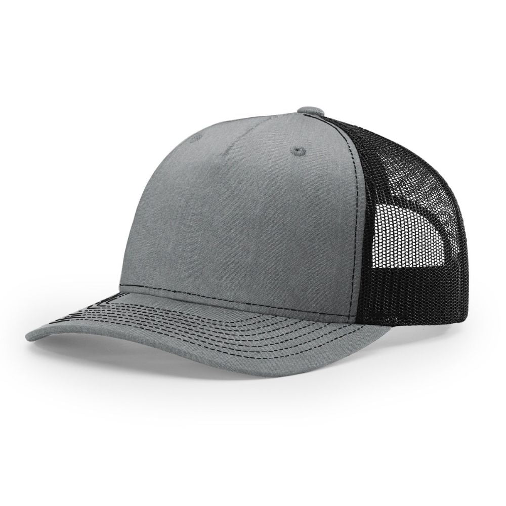 Side view of a Richardson 112FP five-panel trucker hat with a heather grey front panel and curved brim, paired with a black mesh back and black contrast stitching, shown on a white background.
